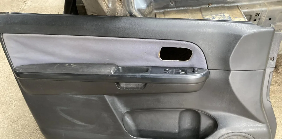 Garniture porte avg SUZUKI GRAND VITARA 2 PHASE 1 occasion