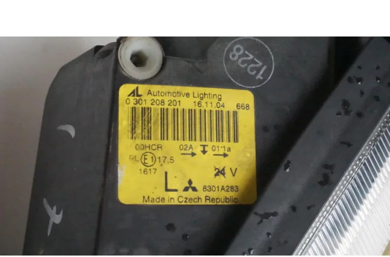 Optique avant principal gauche (feux)(phare) pour MITSUBISHI COLT 6 PHASE 1