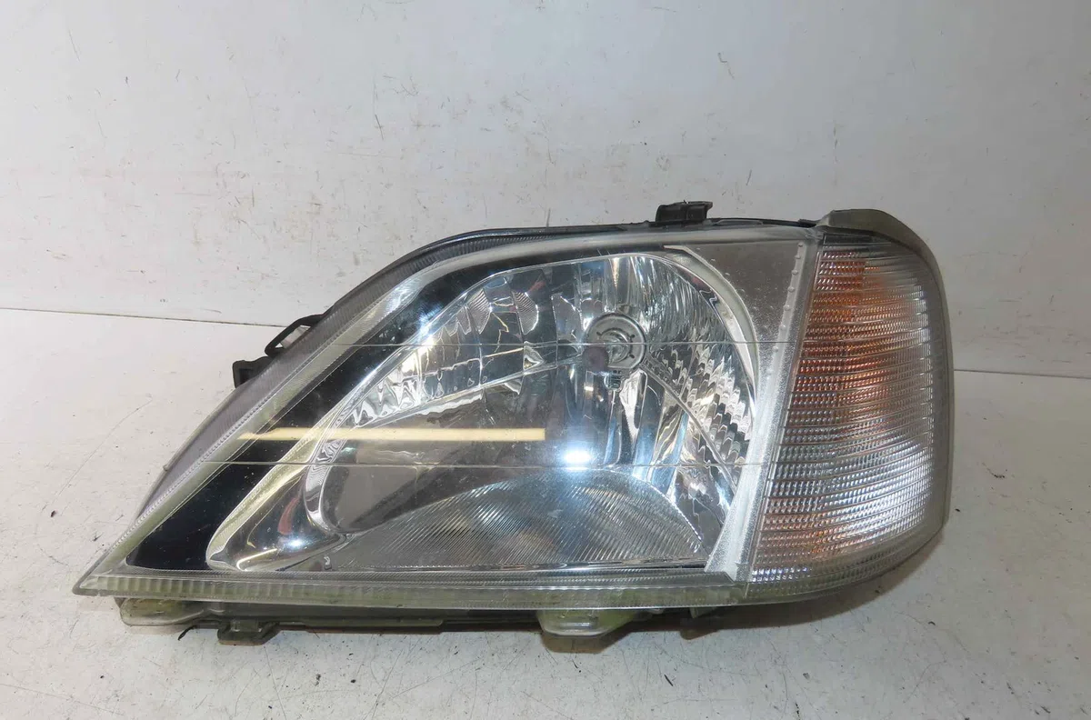 Phare gauche DACIA LOGAN I occasion