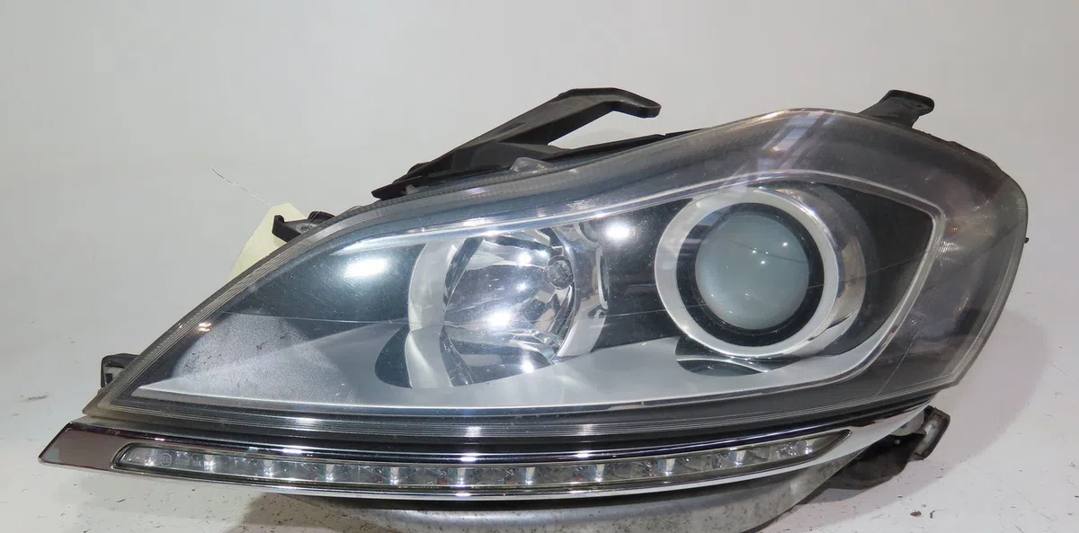 Phare gauche Lancia DELTA III (844_) 1.6 d multijet (844.axf11, 844.axf1a) (2008-2014) occasion